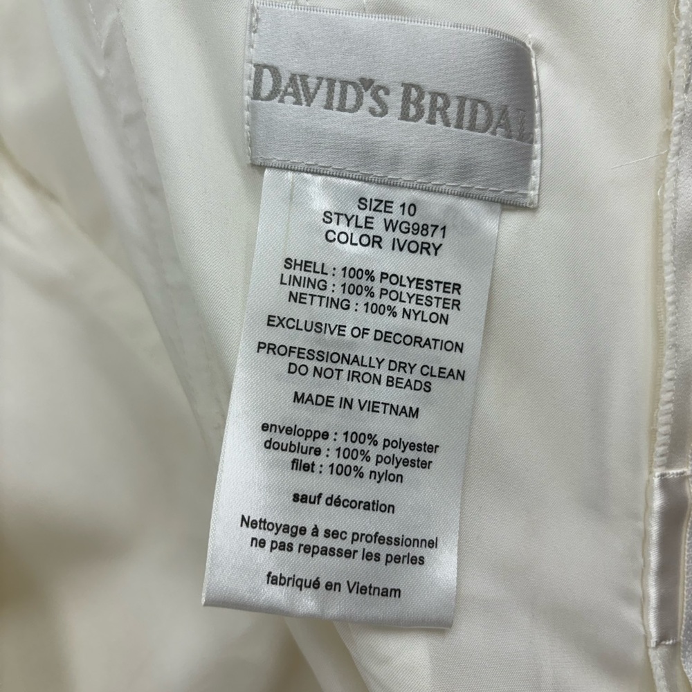 Wedding Dress Ivory Size 10 never wore beaded sash added